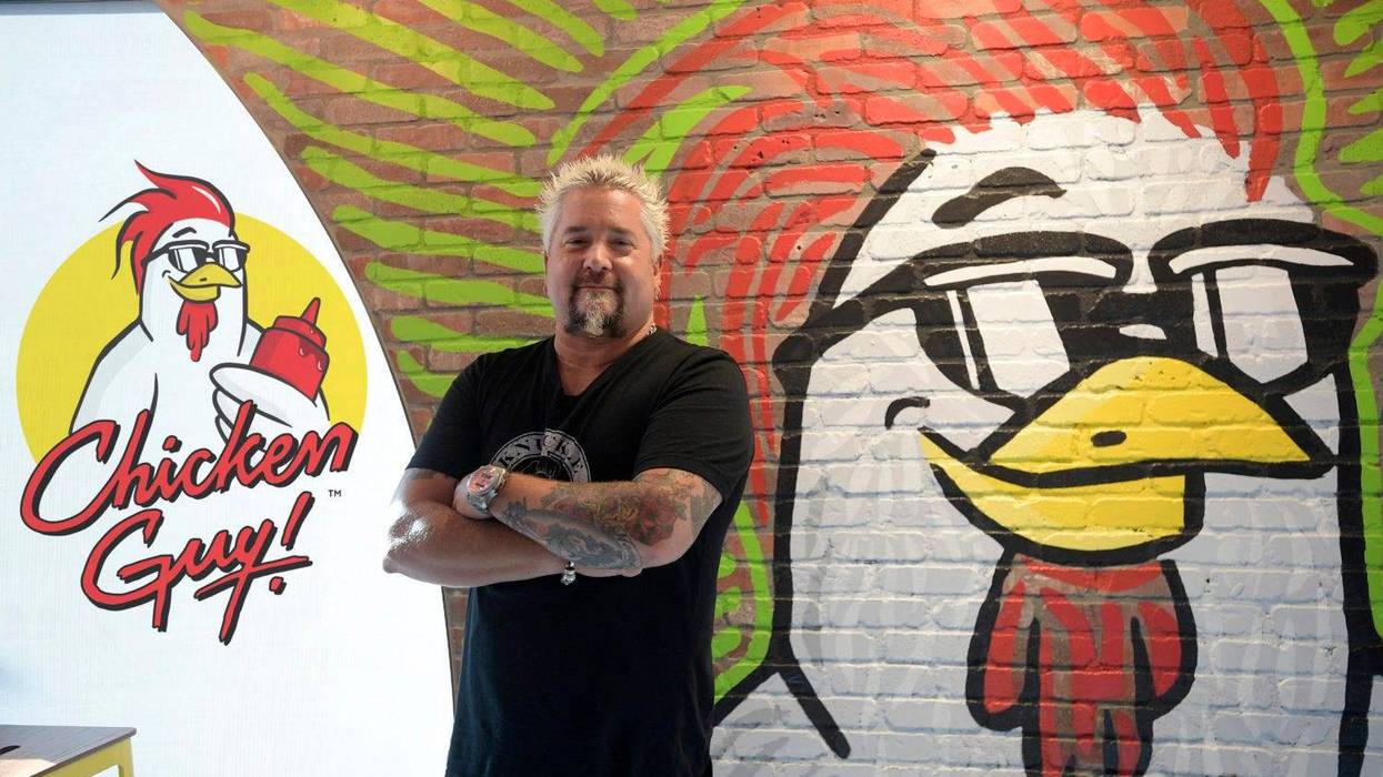 Guy Fieri in front of Chicken Guy! mural