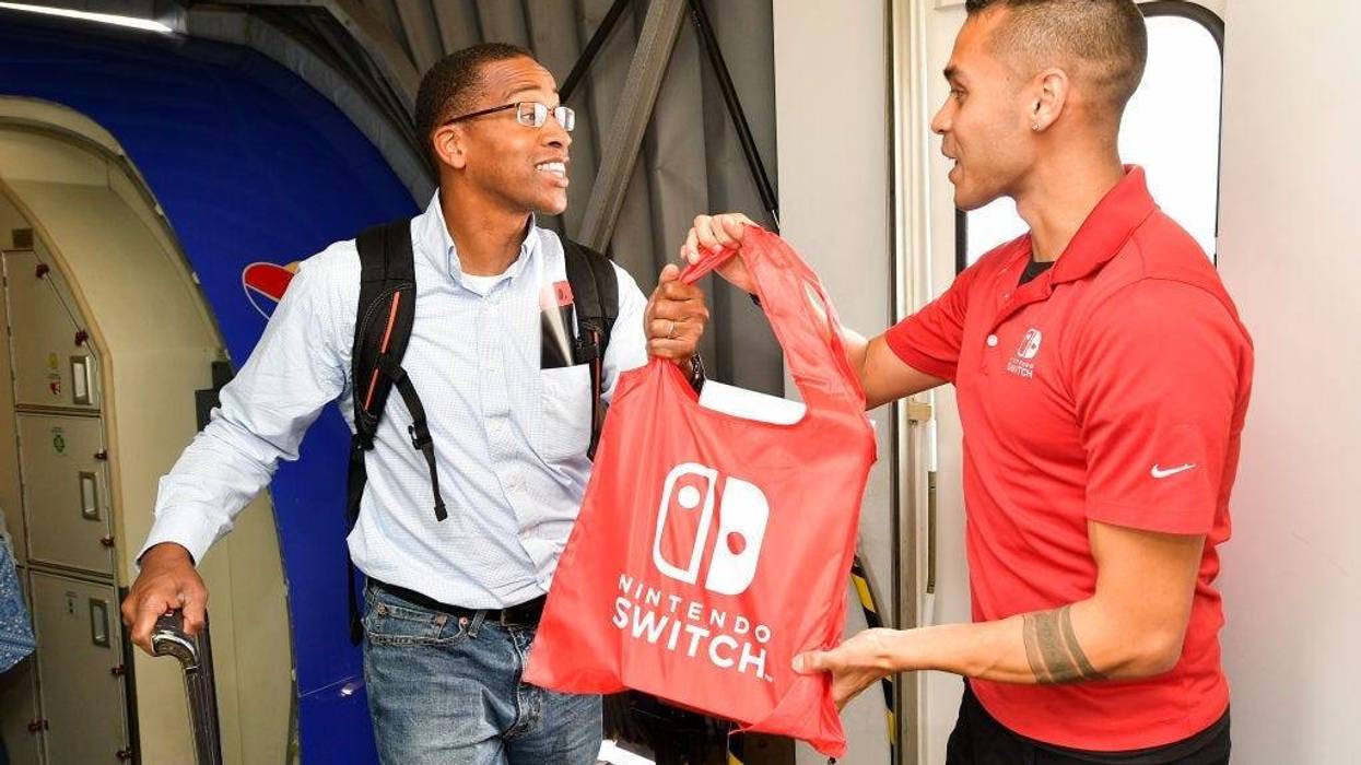 Guy getting a free Nintendo Switch