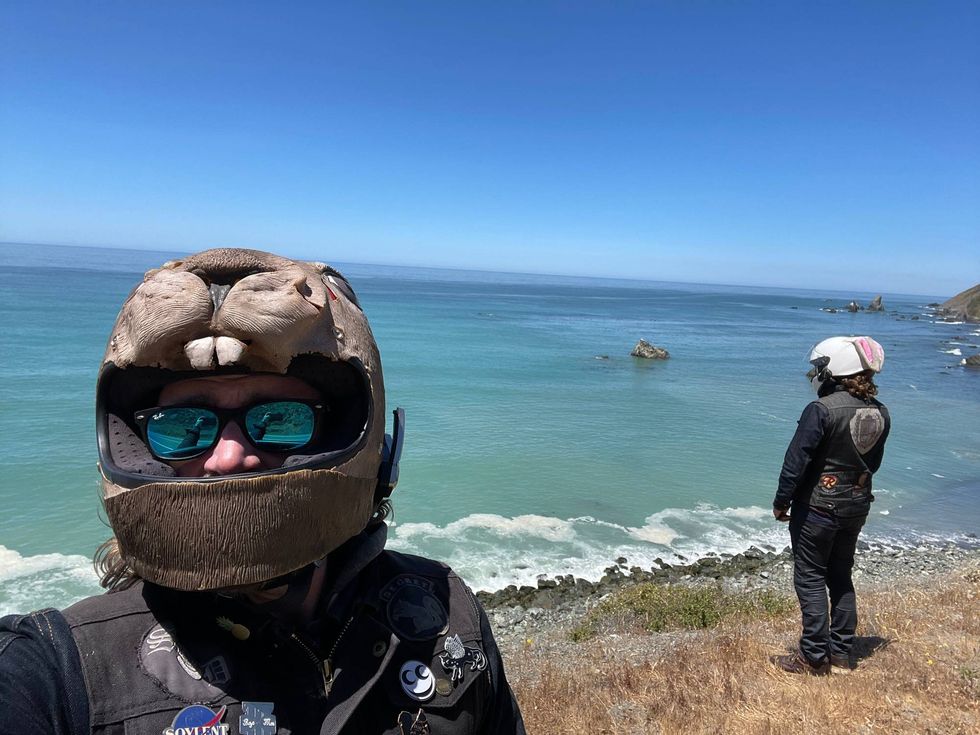 guy in front of some water