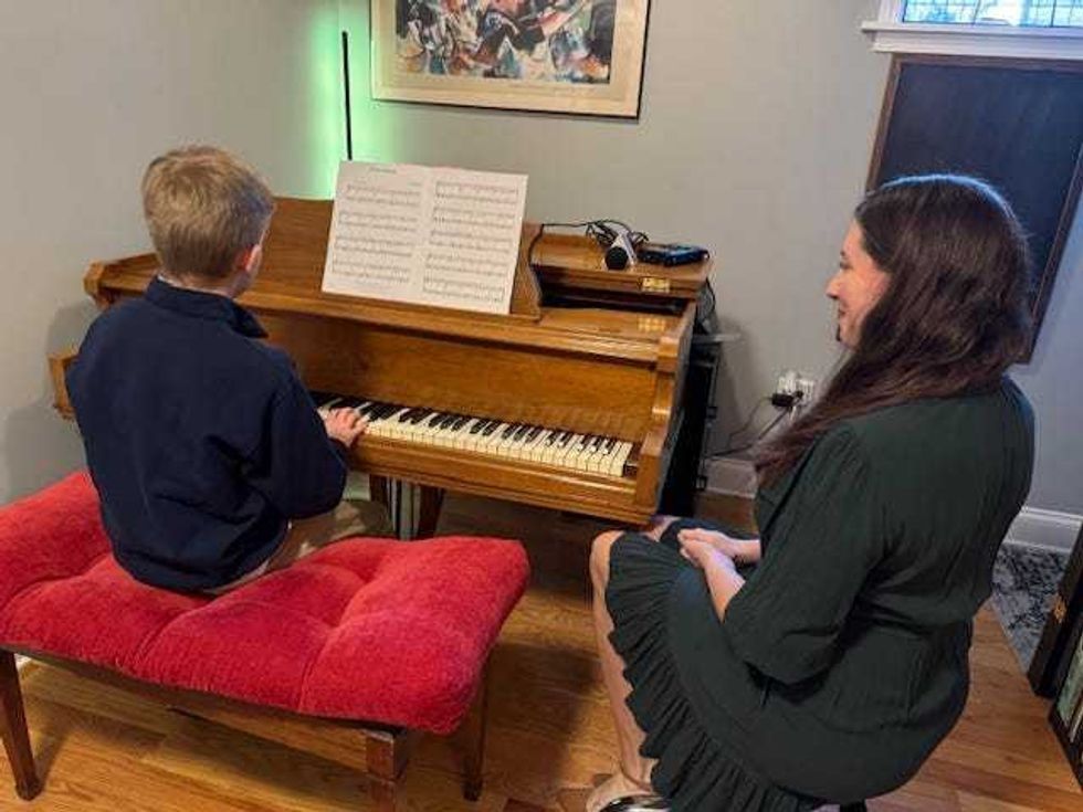 Gwen Lewis teaches students