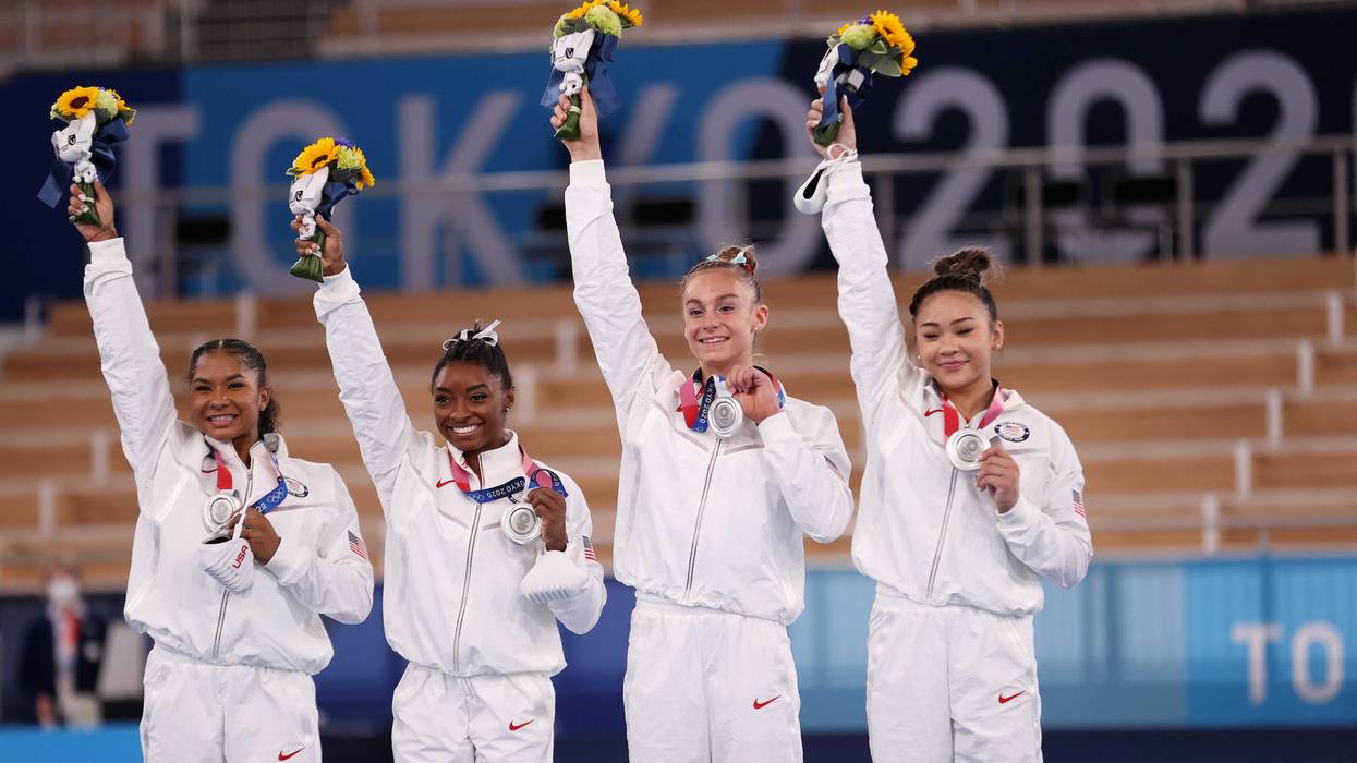 Gymnasts Jordan Chiles, Simone Biles, Grace McCallum and Sunisa Lee of Team USA after winning the silver medal during the Women's Team Final at the Tokyo 2020 Olympic Games, 7/27/21