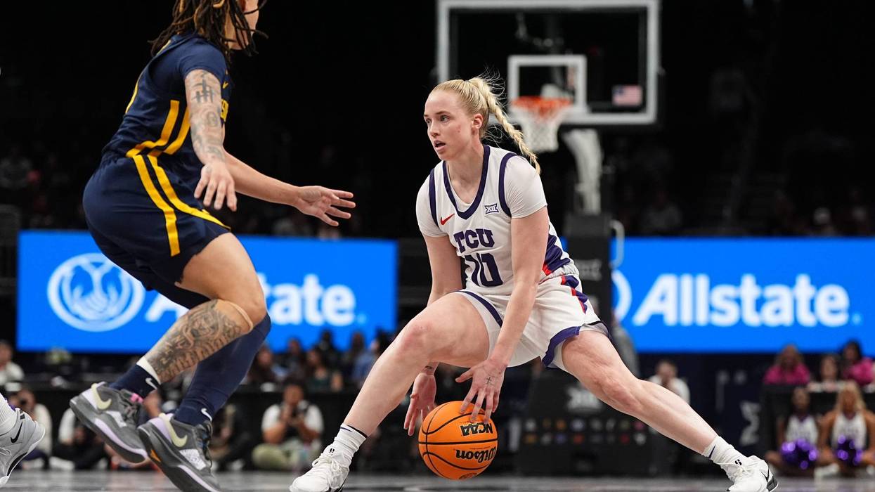 Hailey Van Lith #10 of the TCU Horned Frogs dribbles against West Virginia Mountaineers during the first half in the semi-final round of the women's Big 12 Championship at T-Mobile Center on March 8, 2025, in Kansas City, Missouri.