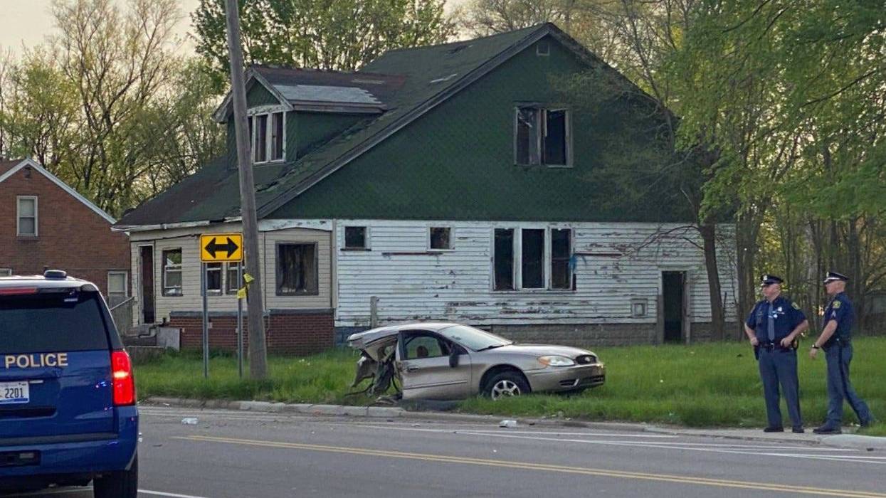 Half of car by state police SUV