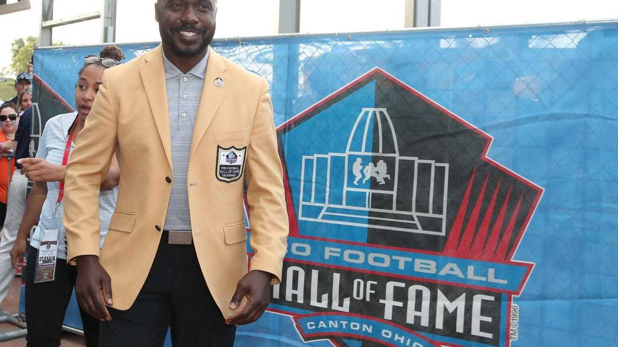 Hall of Fame running back Marshall Faulk arrives during the Professional Football HOF enshrinement ceremonies at the Tom Benson Hall of Fame Stadium.