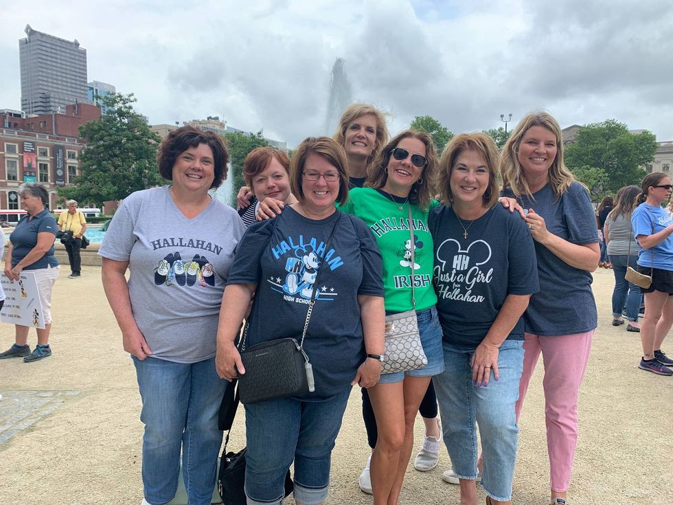 Hallahan High School alumni during the last traditional student run-and-jump into the fountain at Logan Square.