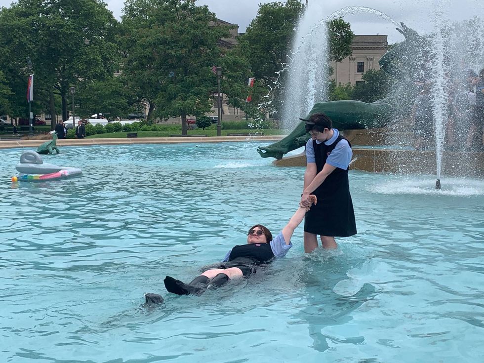 Hallahan High School students during their last run-and-jump into the fountain at Logan Square.