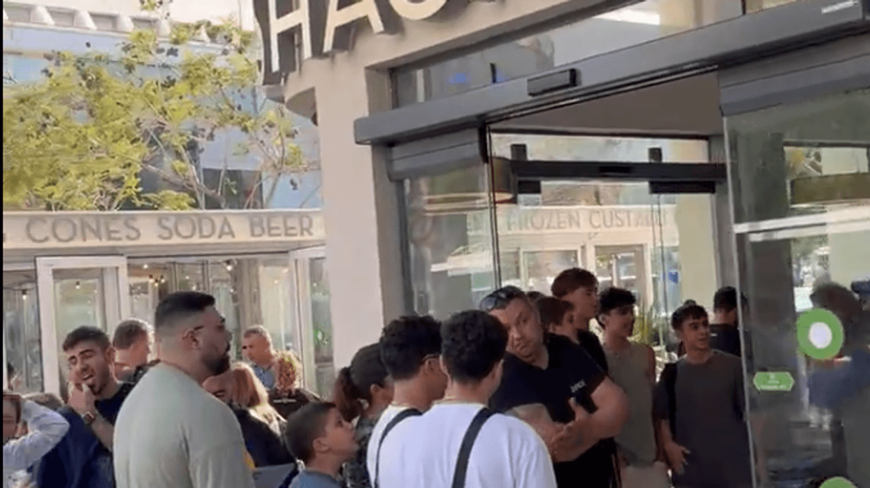 Hamburger-hungry Israelis line up on Feb. 27, 2024 at Shake Shack in Tel Aviv, marking the U.S. chain's launch in the country.