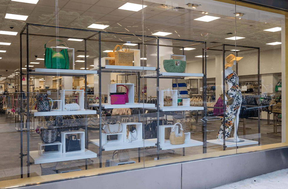 Handbags on display inside the store