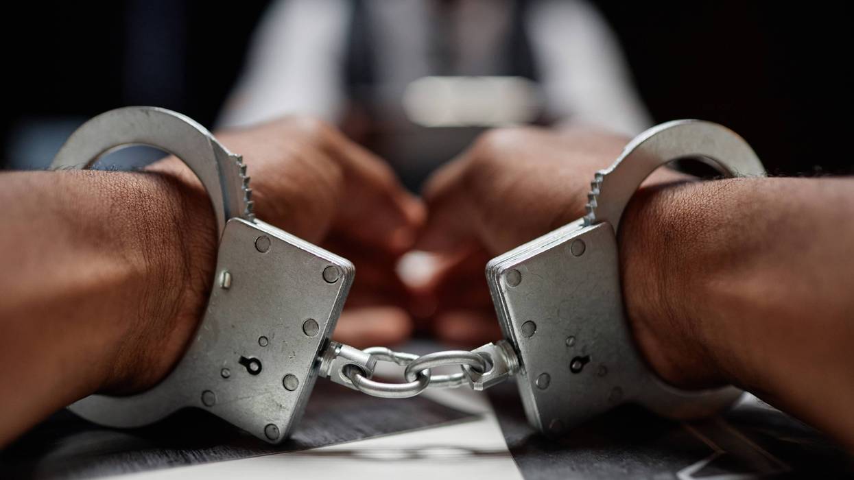 handcuffed person