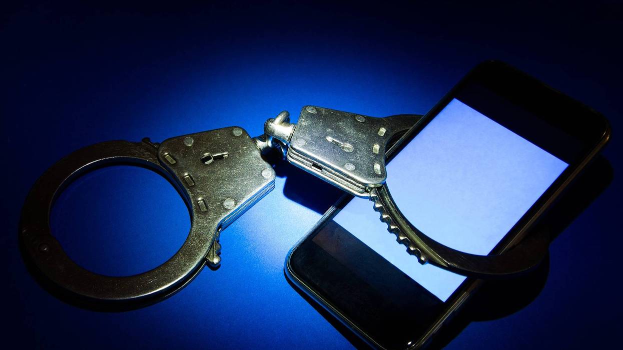 Handcuffs and cellphone