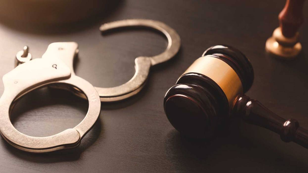 Handcuffs and gavel.