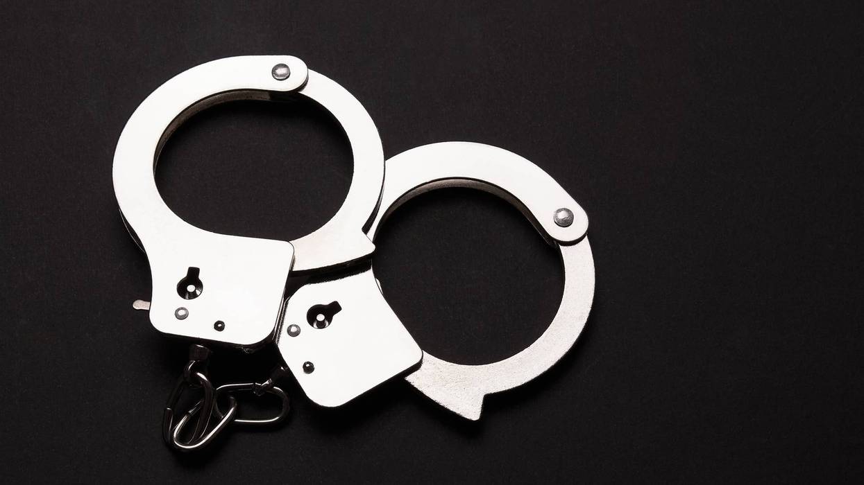 Handcuffs on a black background