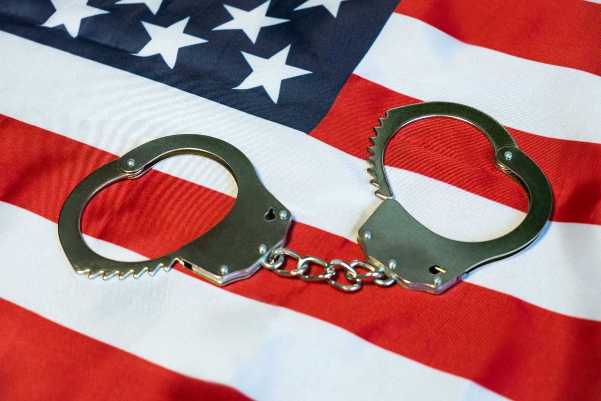 Handcuffs on American flag