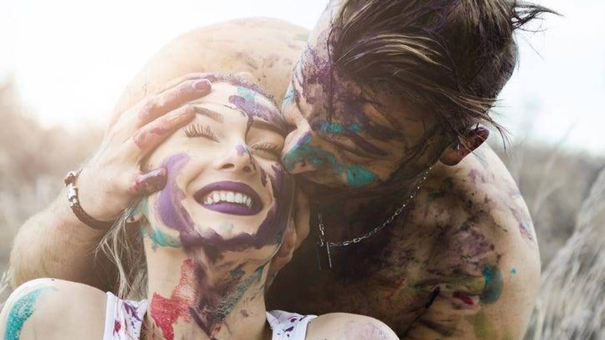 happy boyfriend and girlfriend, man kissing the girl's head