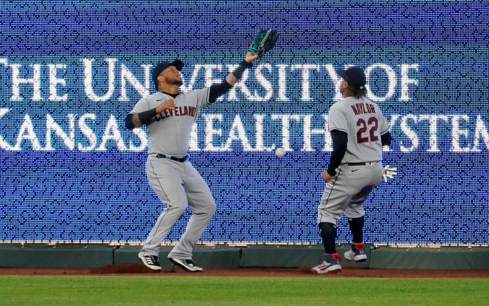 Harold Ramirez and Josh Naylor misplay a fly ball.