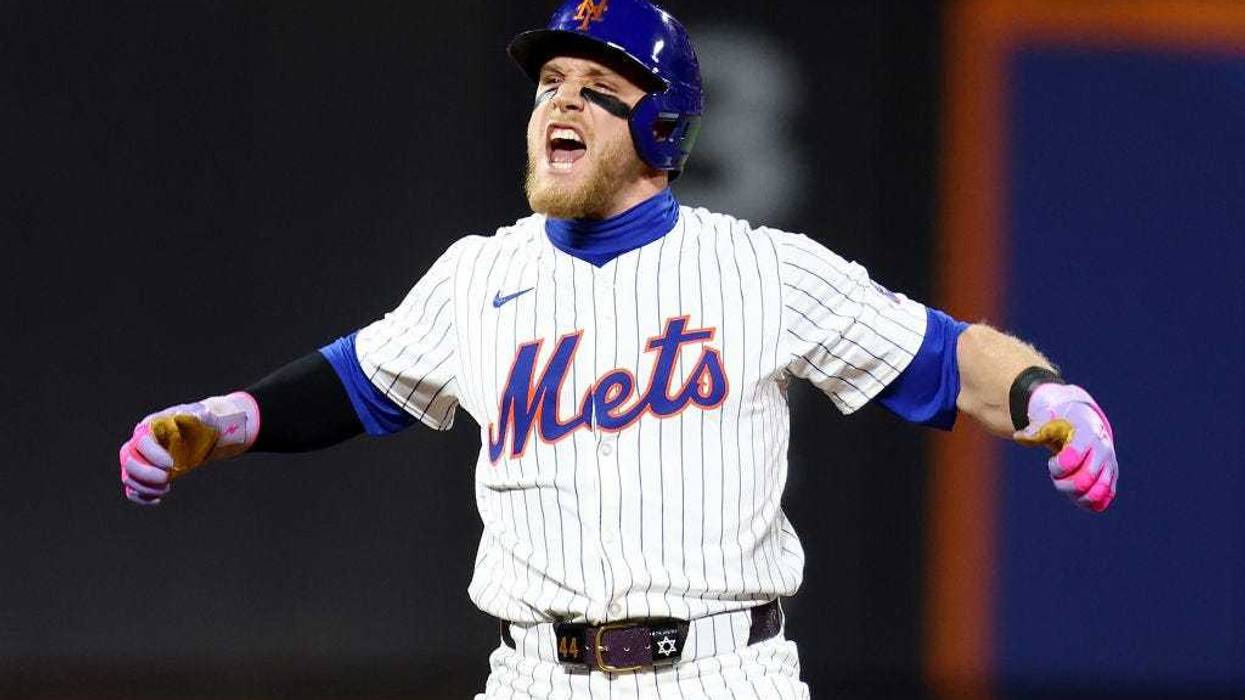 Harrison Bader #44 of the New York Mets celebrates after hitting a a 2-run double to left field in the eighth inning against the Pittsburgh Pirates at Citi Field on April 15, 2024 in New York City. All players are wearing the number 42 in honor of Jackie Robinson Day.