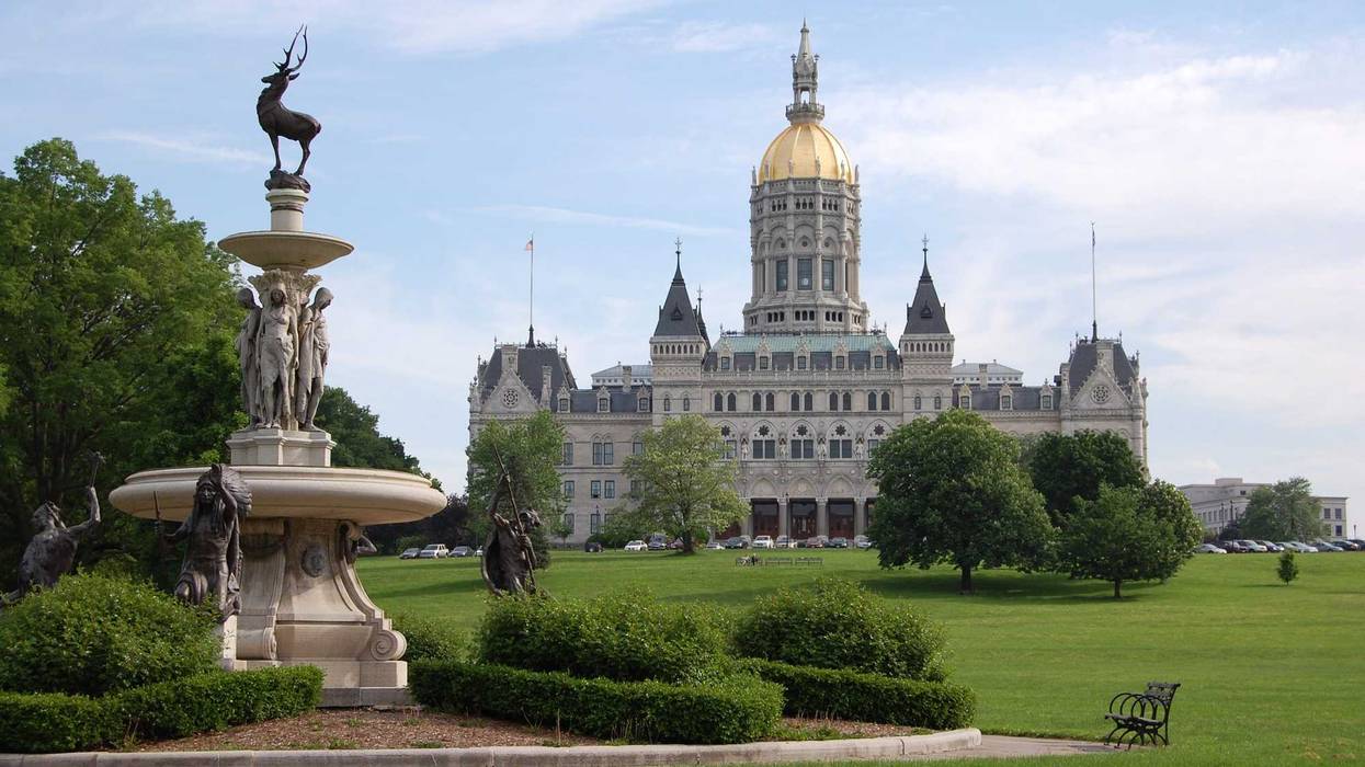 Hartford, Connecticut state capitol building photographed from Bushnell Park. The historic Corning Fountain is in the foreground.