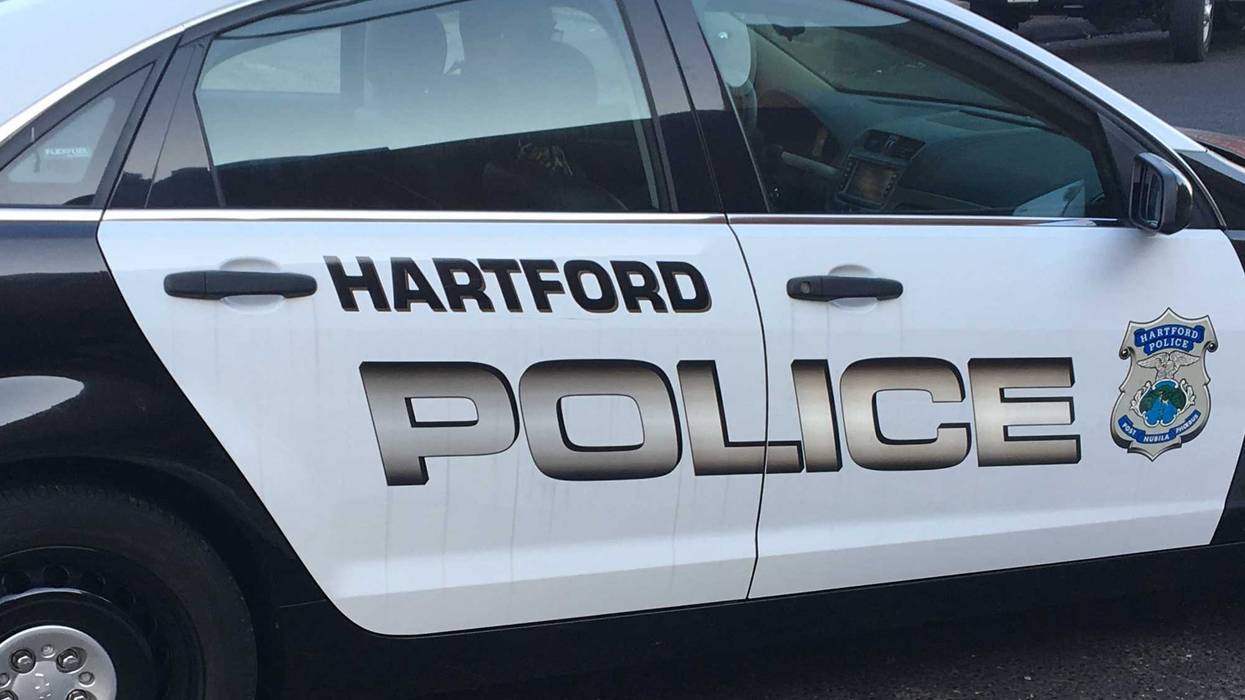Hartford police cruiser at a crime scene investigation