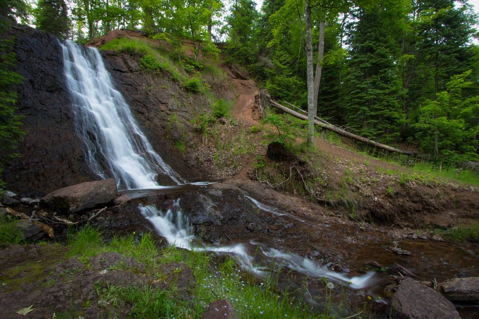 Haven Falls is the beautiful centerpiece of a roadside park in Lac La Belle Michigan. The scenic stop is located in the Upper Peninsula of Michigan in the Keweenaw Peninsula