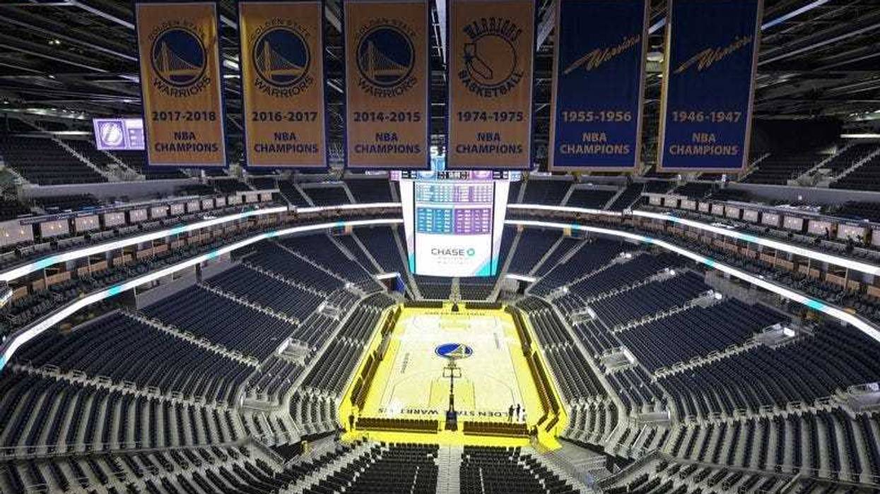 he Golden State Warriors championship banners hang above the seating and basketball court at the Chase Center in San Francisco. The Warriors will play the Brooklyn Nets at home Thursday night, March 12, 2020, in the first NBA game without fans.