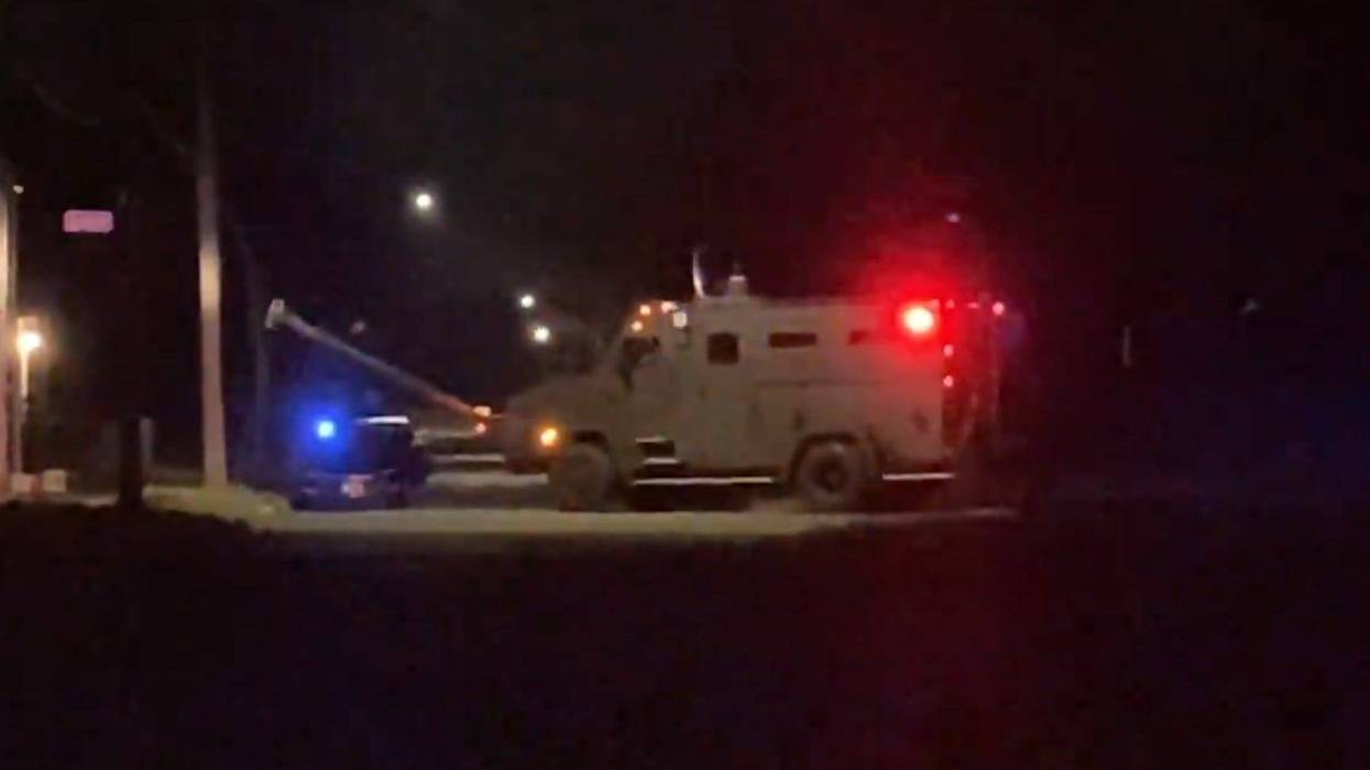 He may have cut some wires.He did have a 357 with him.and he did fire shots at police.five people were rescued from the home, apparently they are safe.And this barricaded situation again had been,, in, in existence since about midnight now, though, it looks like it's over and police are trying to figure out exactly what happened.Still a very active scene reporting live here on Detroit's East side, Charlie Langton WWJ News Radio.