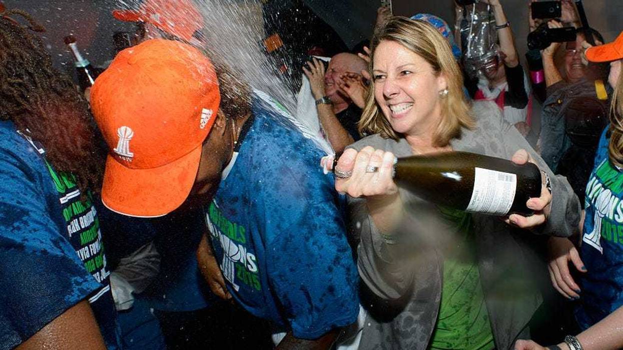 Head coach Cheryl Reeve of the Minnesota Lynx celebrates a win in Game Five of the 2015 WNBA Finals against the Indiana Fever on October 14, 2015 at Target Center in Minneapolis, Minnesota.