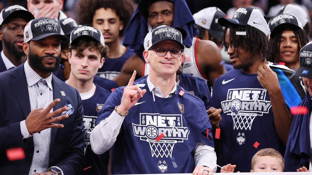 Head coach Dan Hurley of the Connecticut Huskies celebrates after defeating the Illinois Fighting Illini in the Elite 8 round of the NCAA Men's Basketball Tournament at TD Garden on March 30, 2024 in Boston, Massachusetts.