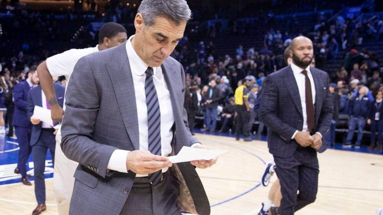 Head coach Jay Wright and assistant coach Kyle Neptune of the Villanova Wildcats