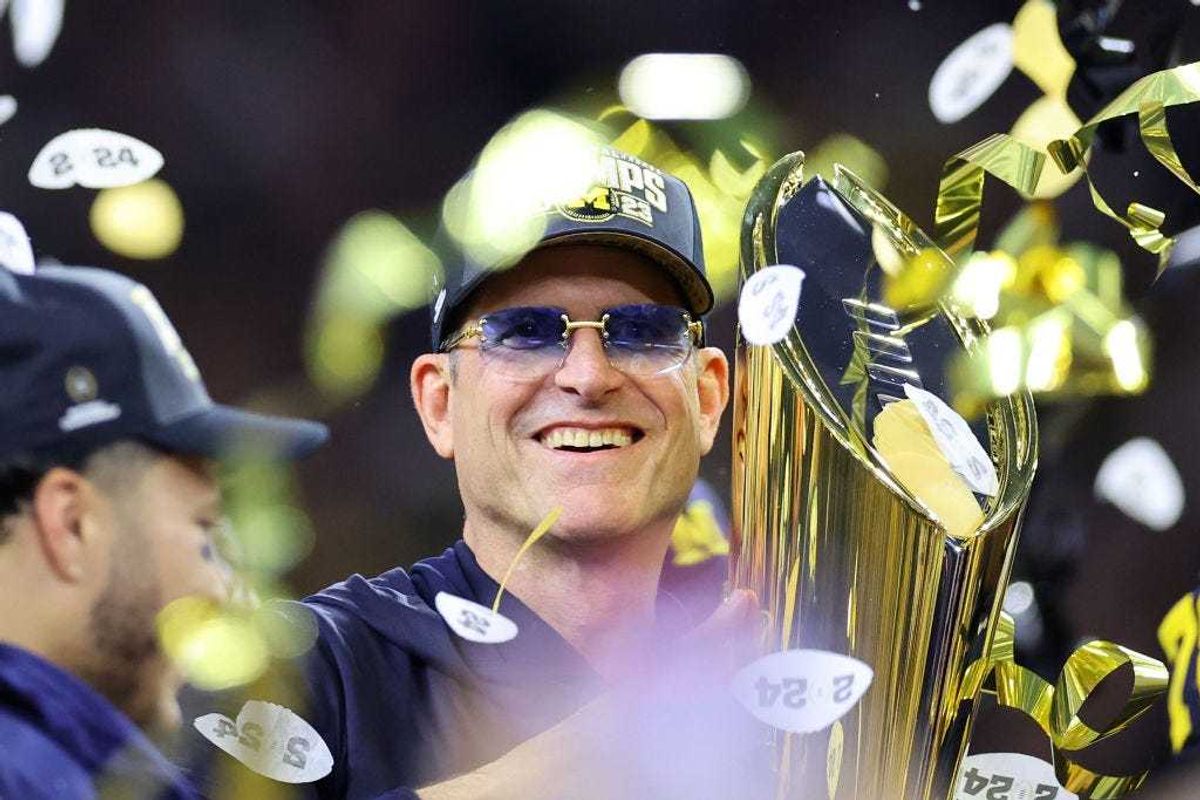 Head coach Jim Harbaugh of the Michigan Wolverines celebrates after defeating the Washington Huskies during the 2024 CFP National Championship game at NRG Stadium on January 08, 2024 in Houston, Texas. Michigan defeated Washington 34-13.