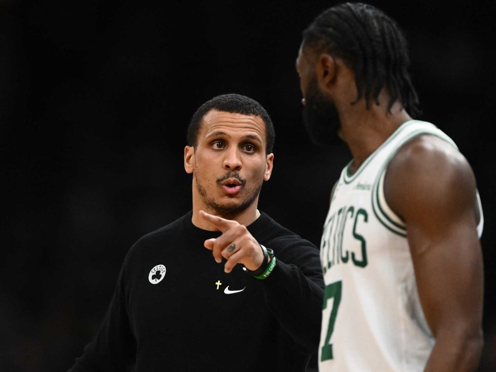 Head coach Joe Mazzulla of the Boston Celtics talks with Jaylen Brown #7 during the second quarter against the Indiana Pacers at the TD Garden on December 29, 2024 in Boston, Massachusetts