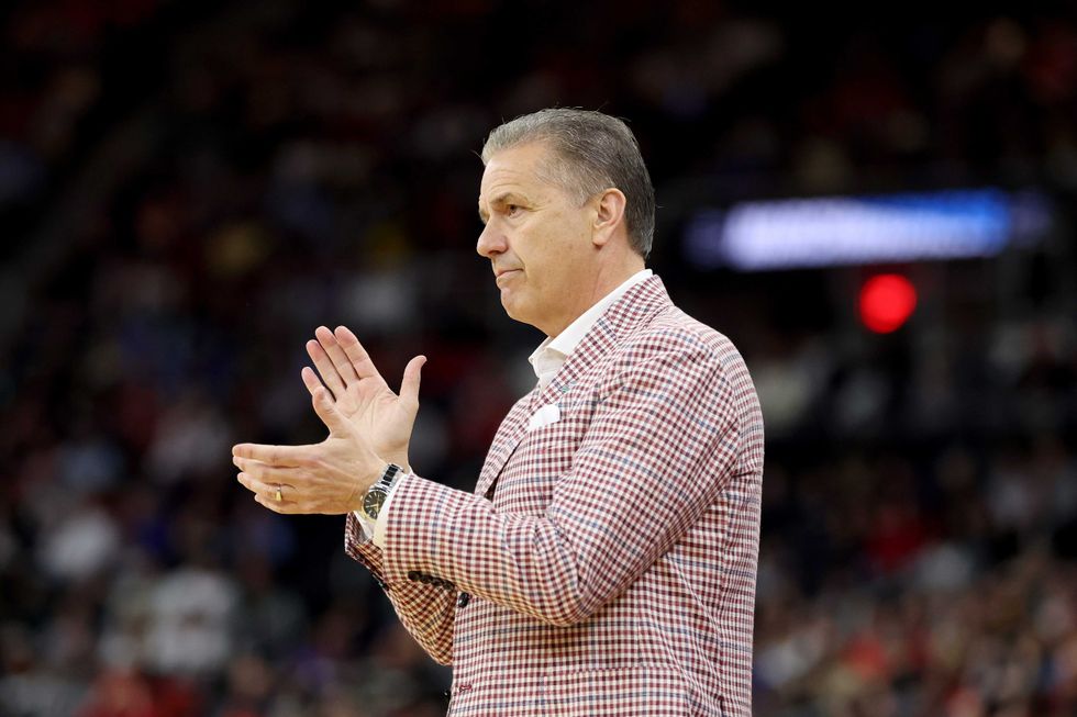 Head coach John Calipari of the Arkansas Razorbacks reacts against the St. John