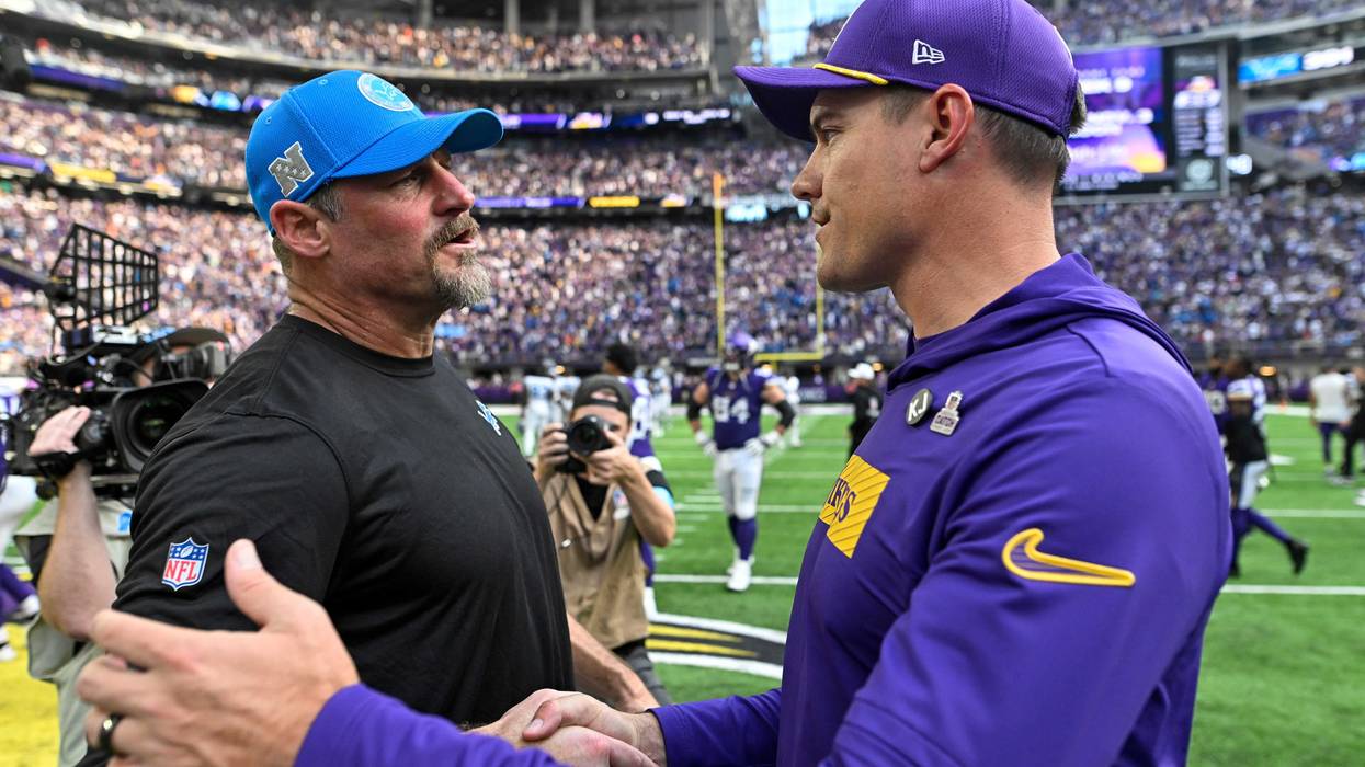 Head coach Kevin O'Connell of the Minnesota Vikings talks head coach Dan Campbell of the Detroit Lions after the Lions defeated the Vikings, 31-29, at U.S. Bank Stadium on October 20, 2024 in Minneapolis, Minnesota.