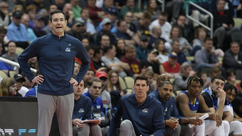 Head coach Martin Ingelsby of the Delaware Blue Hens reacts during the second half against the Villanova Wildcats in the first round game of the 2022 NCAA Men