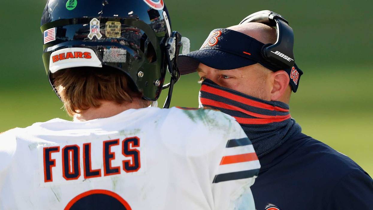 Head coach Matt Nagy of the Chicago Bears talks with quarterback Nick Foles #9 during the third quarter against the Tennessee Titans at Nissan Stadium on November 08, 2020 in Nashville, Tennessee.