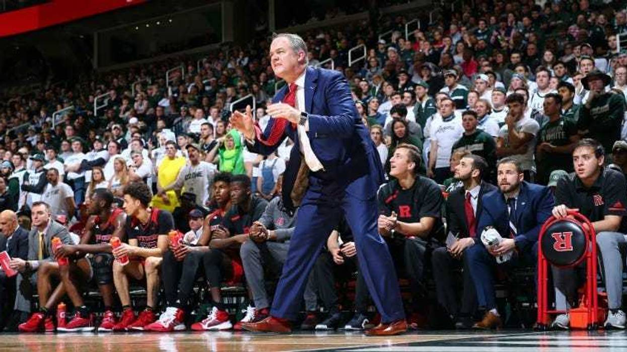 Head coach Steve Pikiell of the Rutgers Scarlet Knights gives instructions to his players from the bench in the first half against the Michigan State Spartans at Breslin Center on February 20, 2019 in East Lansing, Michigan.