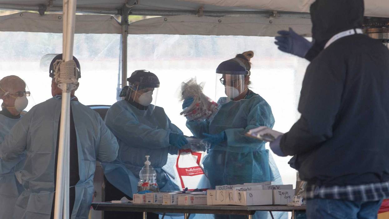 Health workers at the Ocean County Covid testing site at Ocean County College in Toms River on Nov. 18