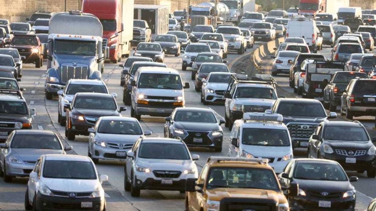 Heavy afternoon traffic moves along the I-5 on November 23, 2022 in Los Angeles, California.