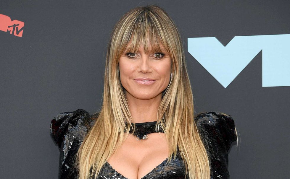 PHOTOS: Heidi Klum, 48, stuns in pink bikini while on Italian getaway