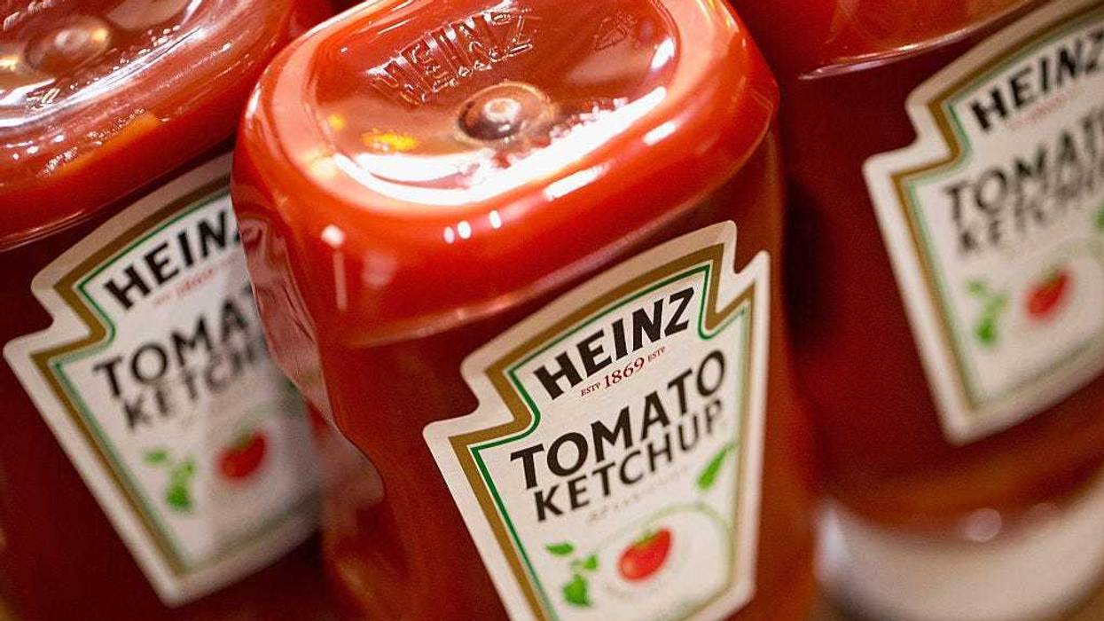Heinz Tomato Ketchup is shown on March 25, 2015 in Chicago, Illinois. Kraft Foods Group Inc. said it will merge with H.J. Heinz Co. to form the third largest food and beverage company in North America with revenue of about $28 billion.