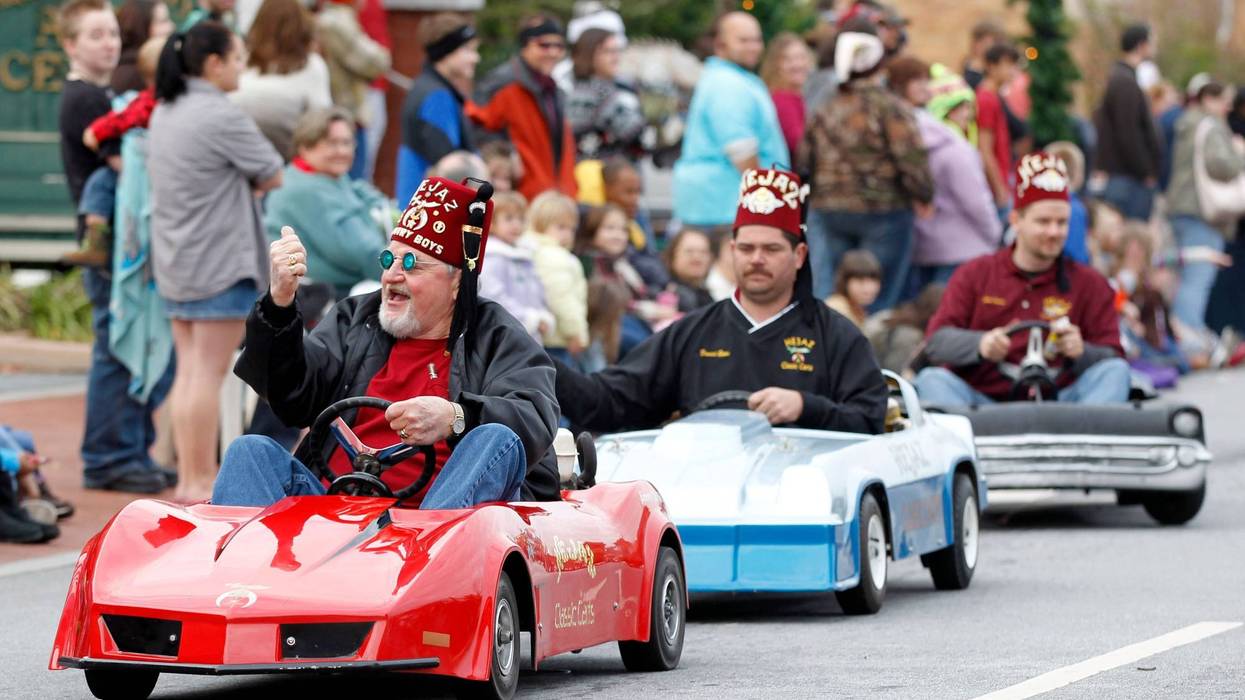 Hejaz Shriners ride miniature cars along Main Street during Sunday's Christmas parade in Anderson in 2011. Anderson Christmas Parade Memories 2011