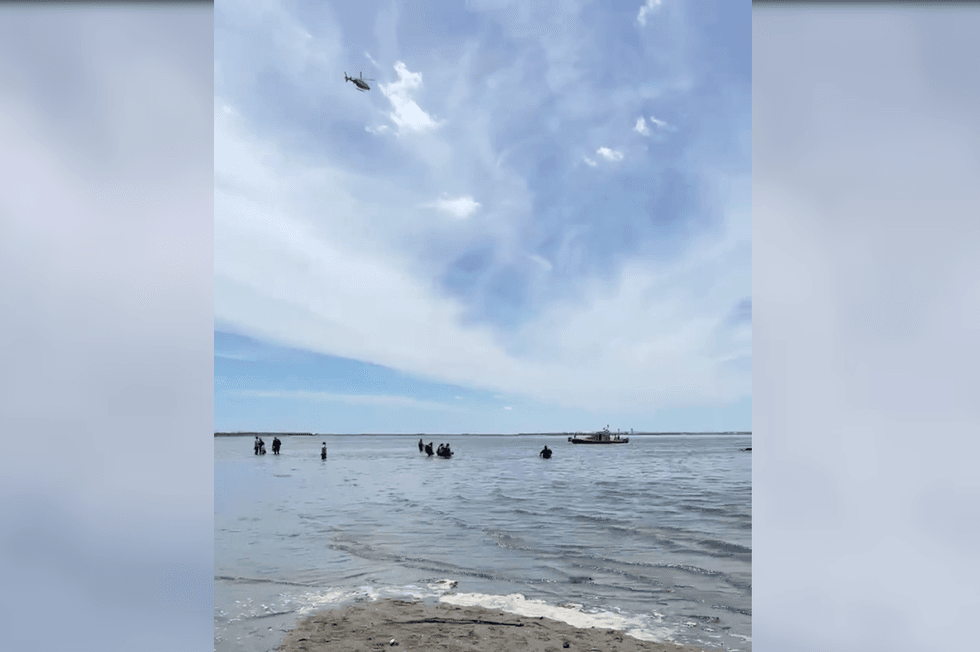 Helicopters and rescue boats were seen near the North Channel Bridge in Jamaica Bay