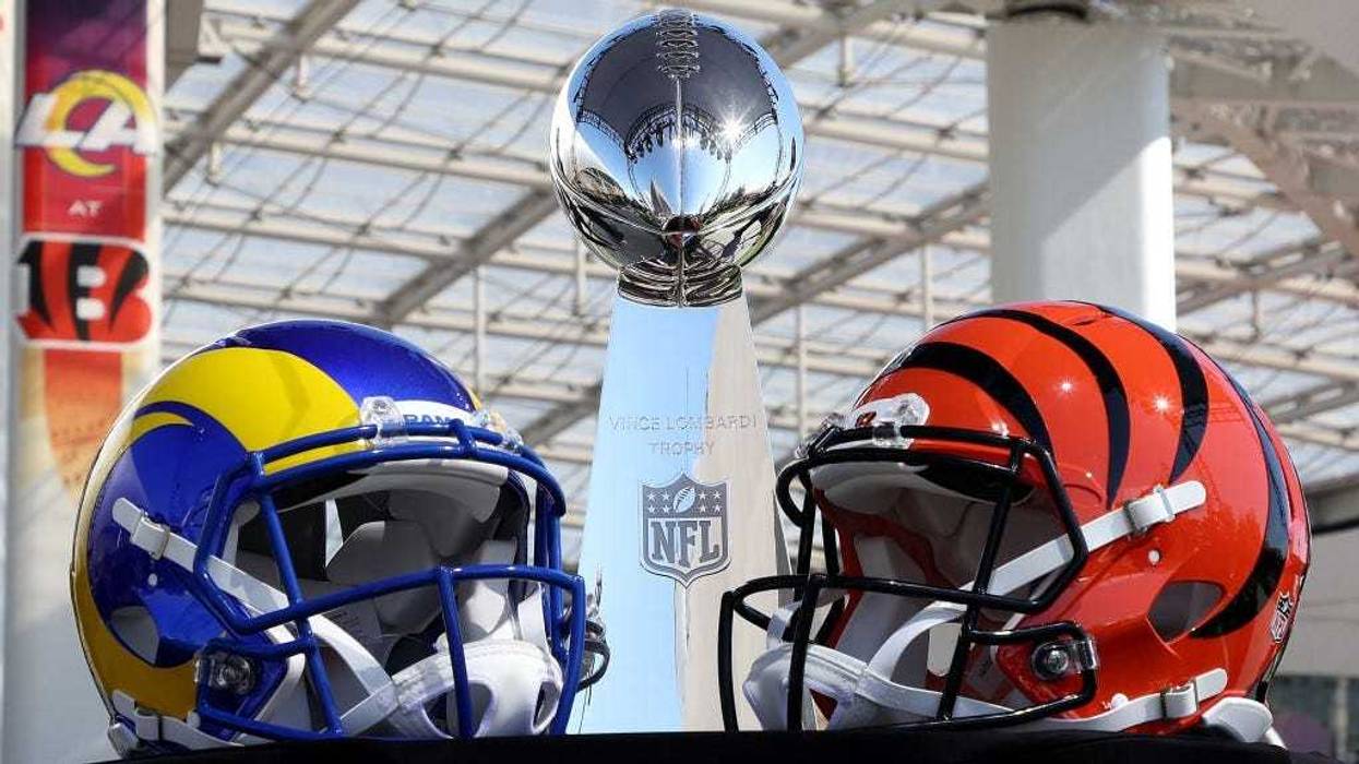 Helmets of the Los Angeles Rams and Cincinnati Bengals sit in front of the Lombardi Trophy as NFL Commissioner Roger Goodell (not pictured) addresses the media on February 09, 2022 at the NFL Network's Champions Field at the NFL Media Building on the SoFi Stadium campus in Inglewood, California.