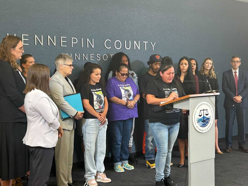 Hennepin County Attorney Mary Moriarty (left, with teal folder) announced sentencing for Damarean Bible in the shooting death of Savannah Williams at a Minneapolis light rail station last fall.