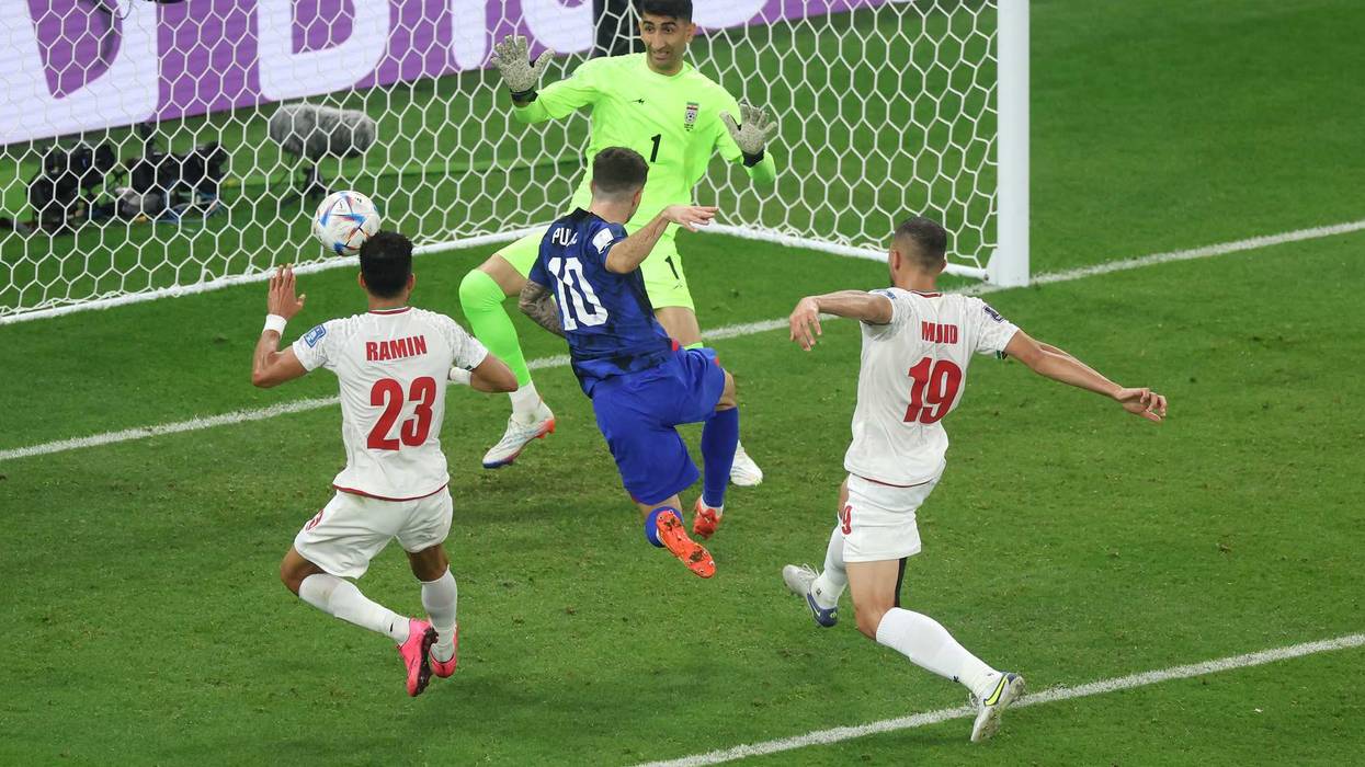 Hershey, Pennsylvania's Christian Pulisic scores Team USA's first goal during the FIFA World Cup Qatar 2022 Group B match against Iran at Al Thumama Stadium on November 29, 2022 in Doha, Qatar.