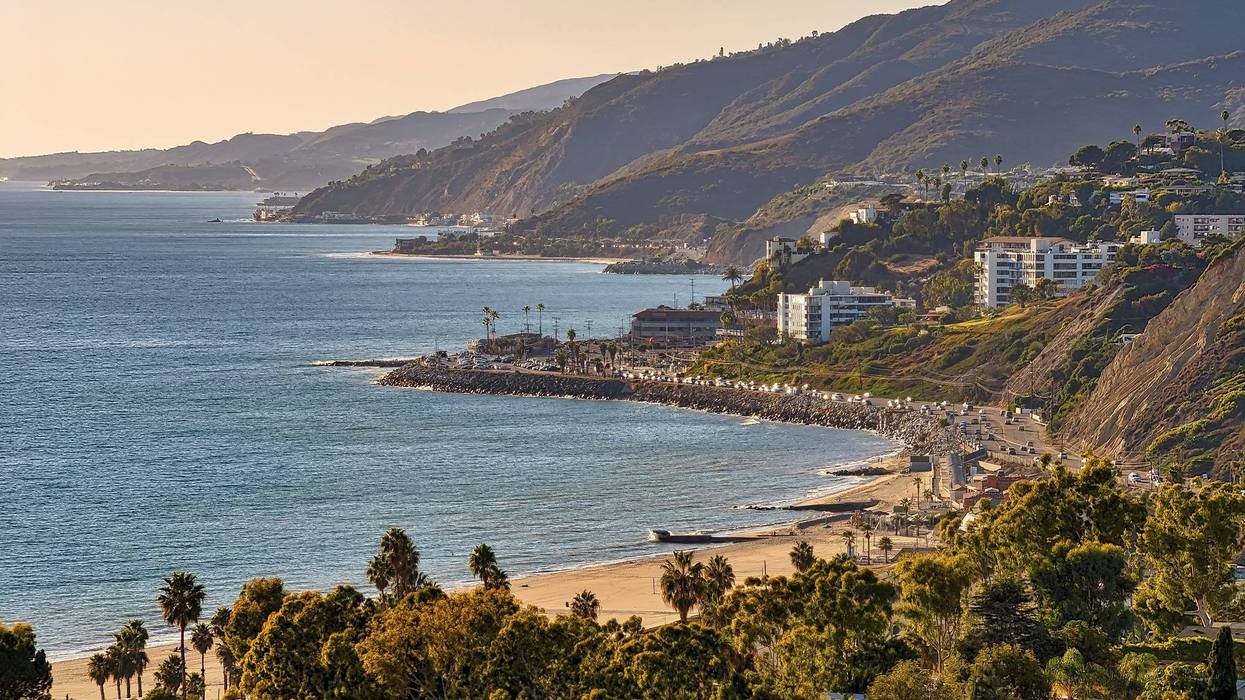 High angle view of Southern California coast and beach with Santa Monica mountains in the background.