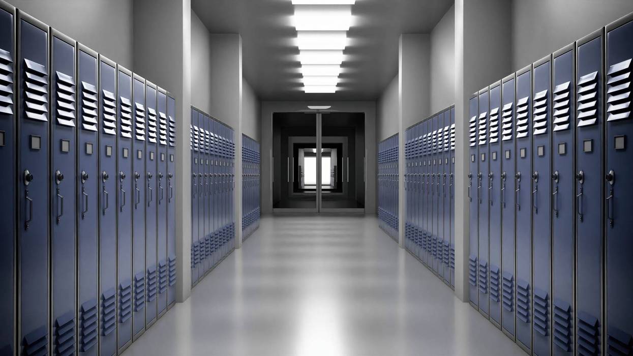 High school lobby with blue lockers.
