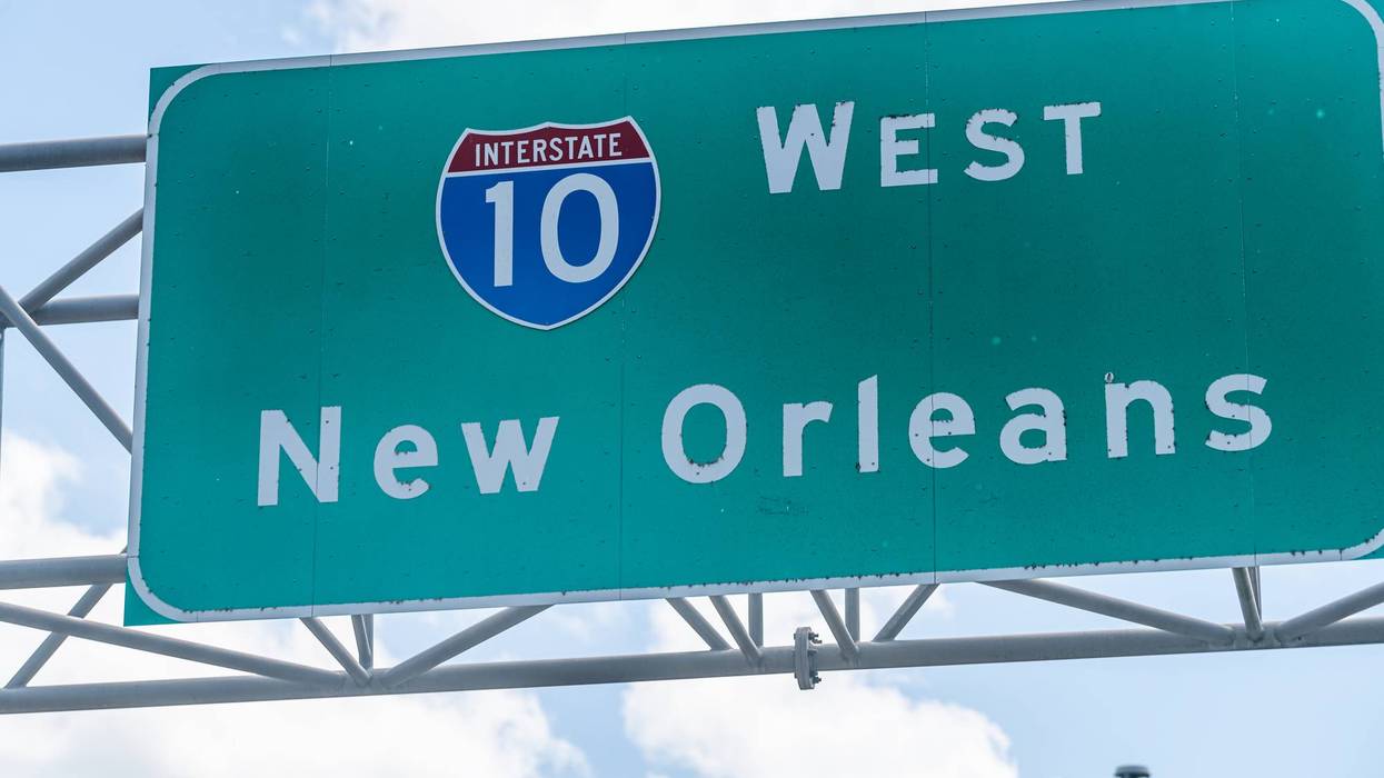Highway road i10 west interstate 10 with direction sign and text on street for New Orleans in Lousiana with symbol