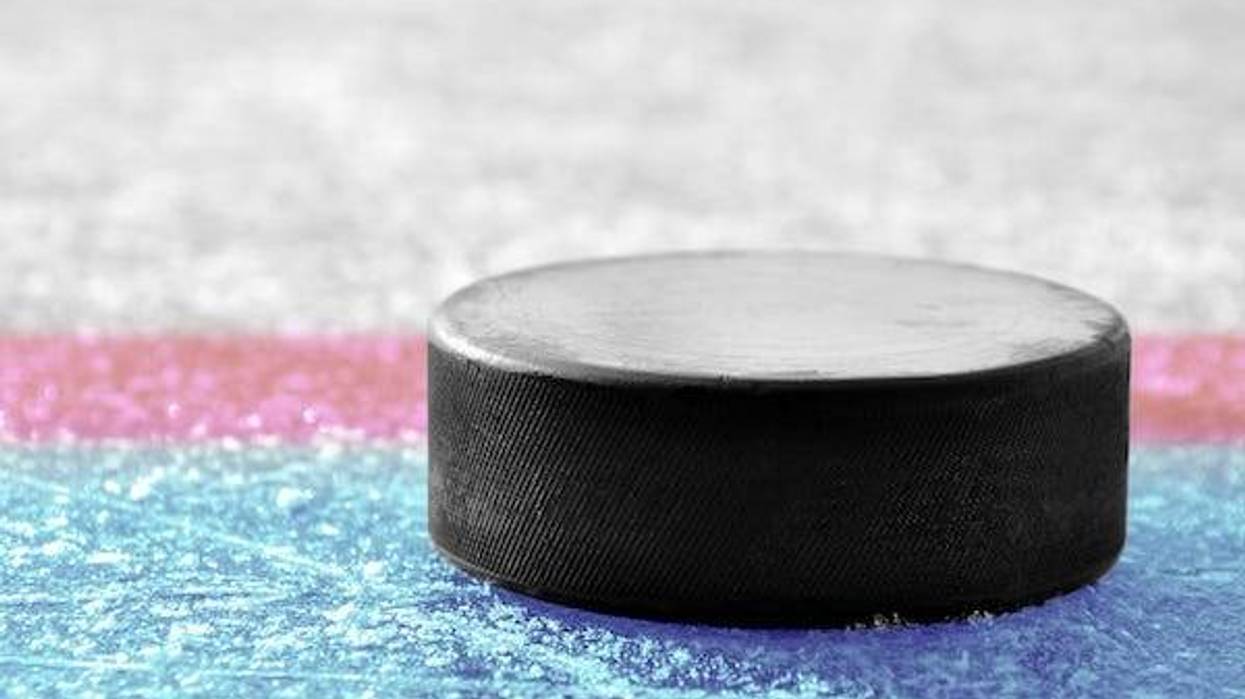 Hockey puck sitting on ice