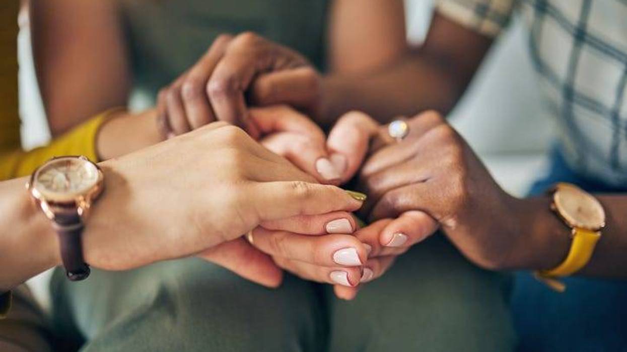 Holding hands, circle and support, trust and prayer, solidarity and hope, empathy or care