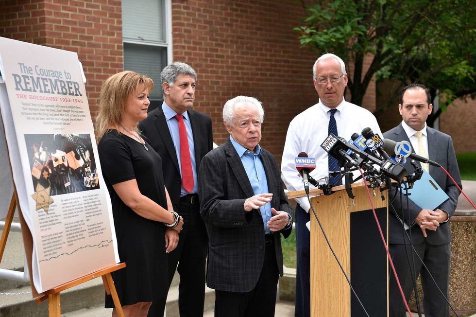Holocaust survivor Mark Schonwetter, center, and his daughter, Ann Arnold, left, at a press conference in Tenafly, New Jersey, on July 2, 2021